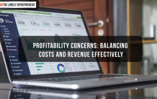 A laptop on a wooden table displaying business metrics and analytics on the screen, symbolizing data-driven strategies for managing costs and maximizing profitability.